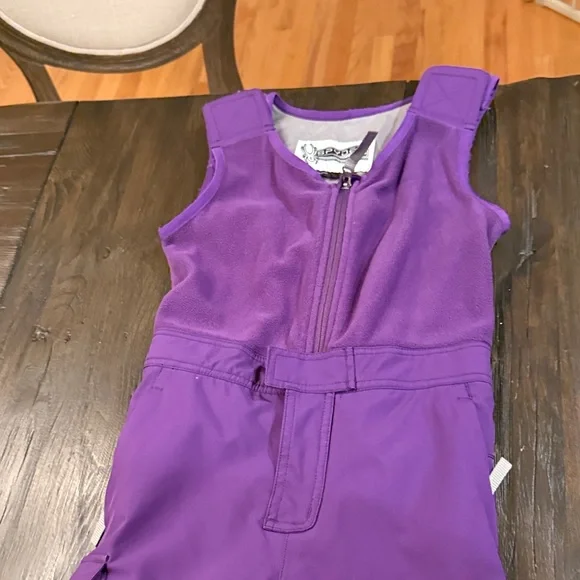 Spyder waterproof kids ski pants in purple. - Picture 2 of 5